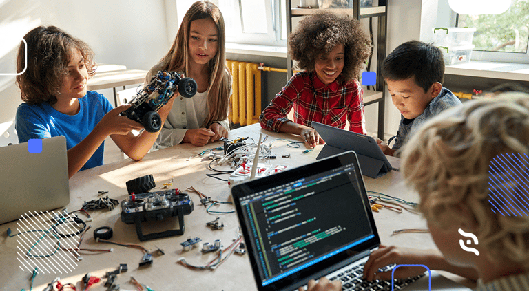 imagem de 5 crianças e jovens em meio a robôs e computador verificando as tendências para educação em 2023